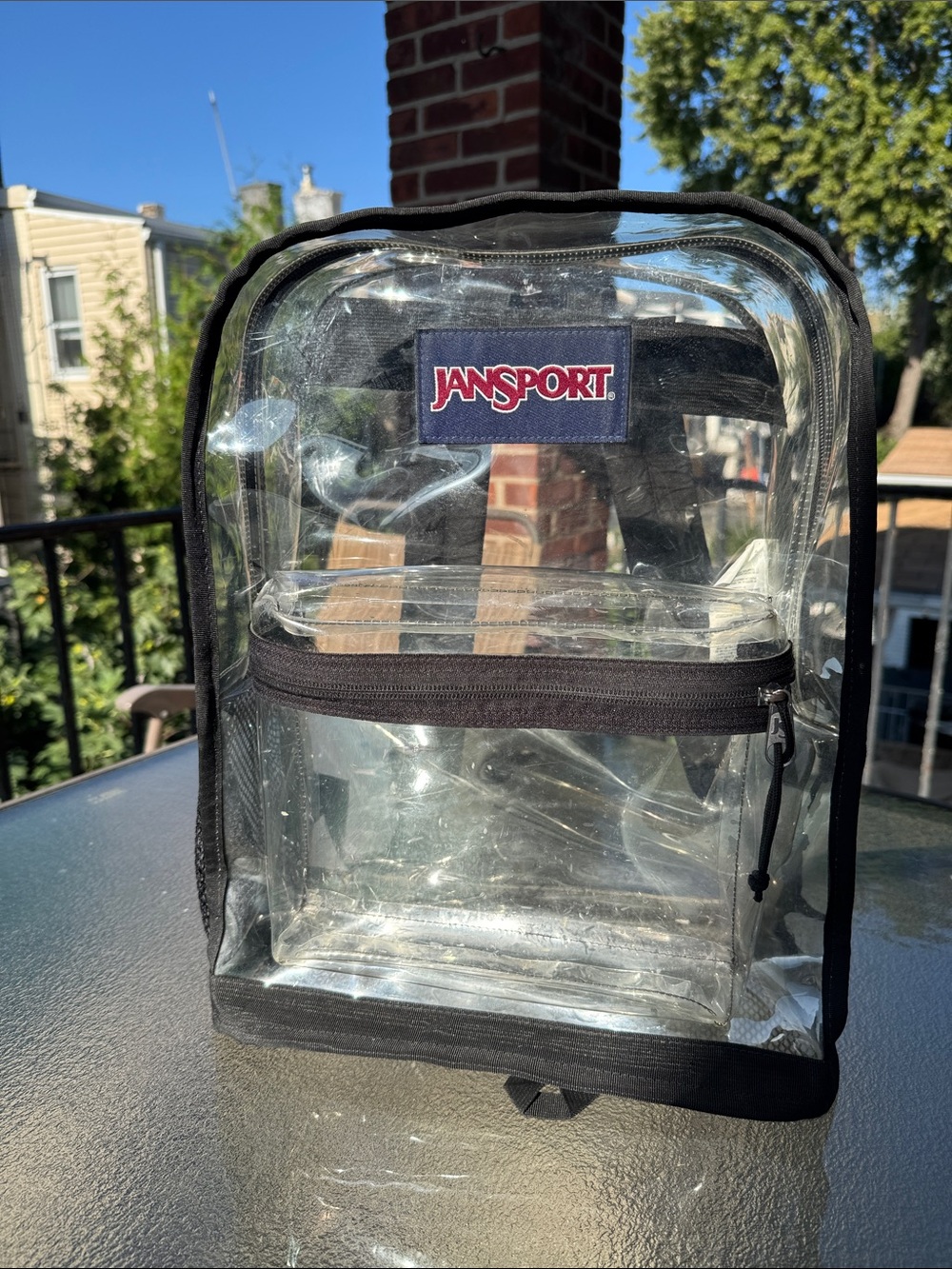 JanSport Clear Backpack with Black Trim and Front Pocket
